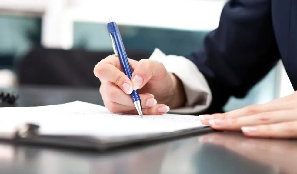 buying a bar - signing a purchase agreement