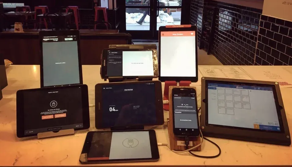 Multiple tablets for managing orders from different food delivery apps