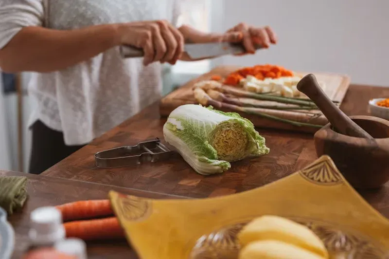 how to do video marketing for restaurants - an example photo of a person chopping vegetables