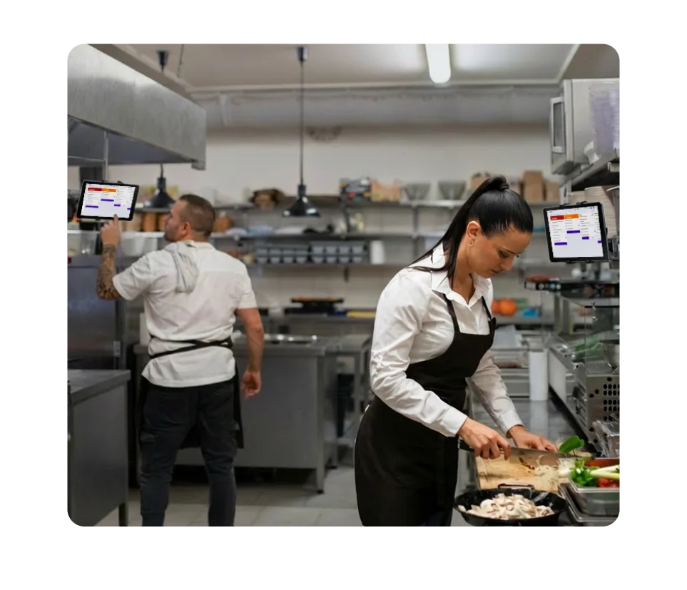 Kitchen display system screen split across multiple stations for different prep areas