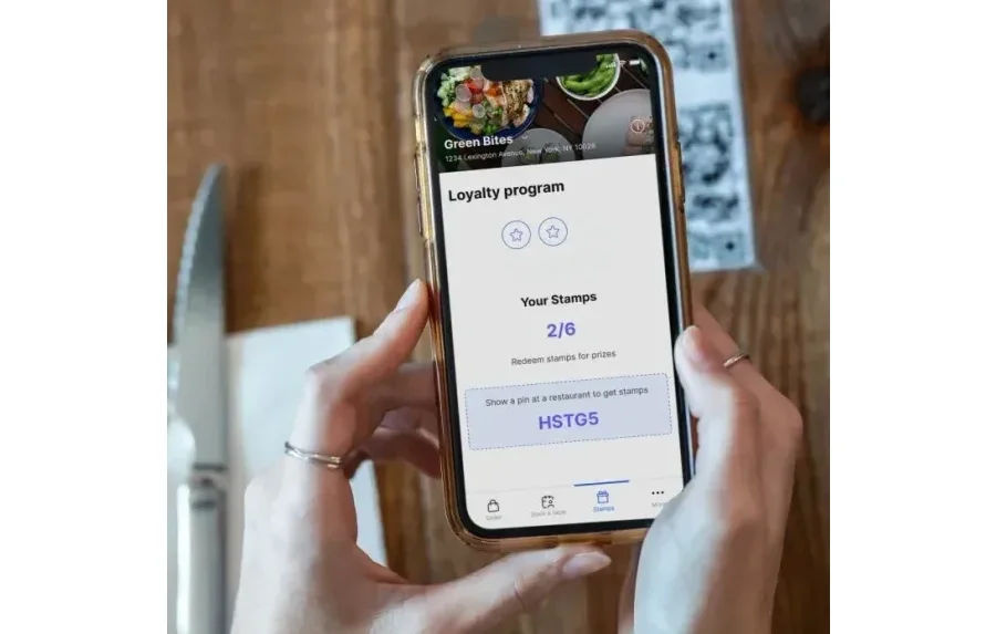 Example of restaurant loyalty program opened on guest phone