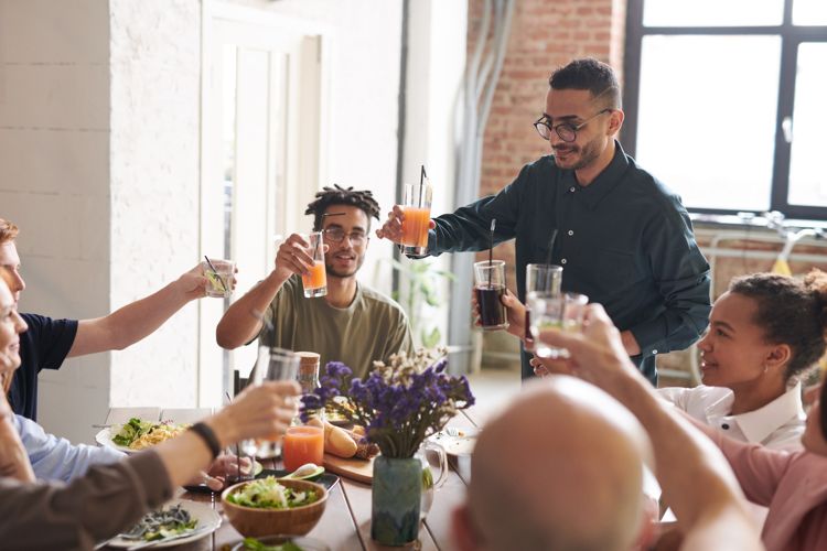 Happy people in restaurant. thanks to proper restaurant marketing.